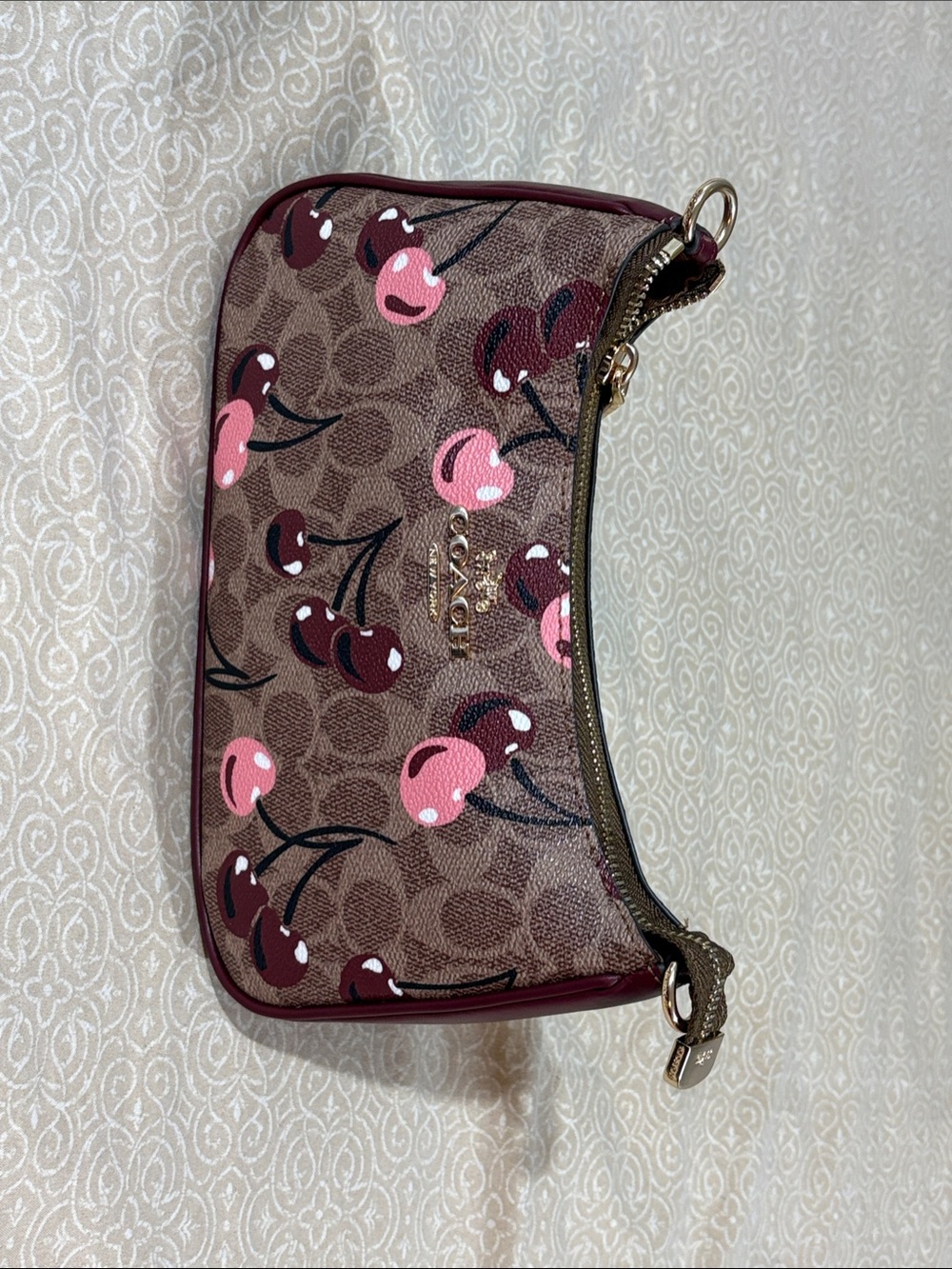 Coach Brown Signature Canvas Wristlet with Pink & Burgundy Cherry Print